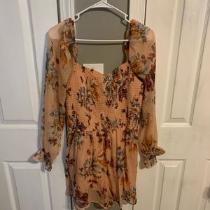 coral floral romper.